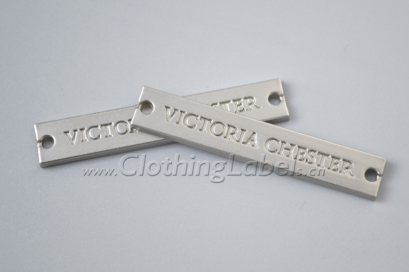 metal tags with 2 holes